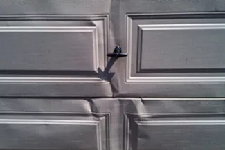 Réparation porte de garage – panneaux et sections